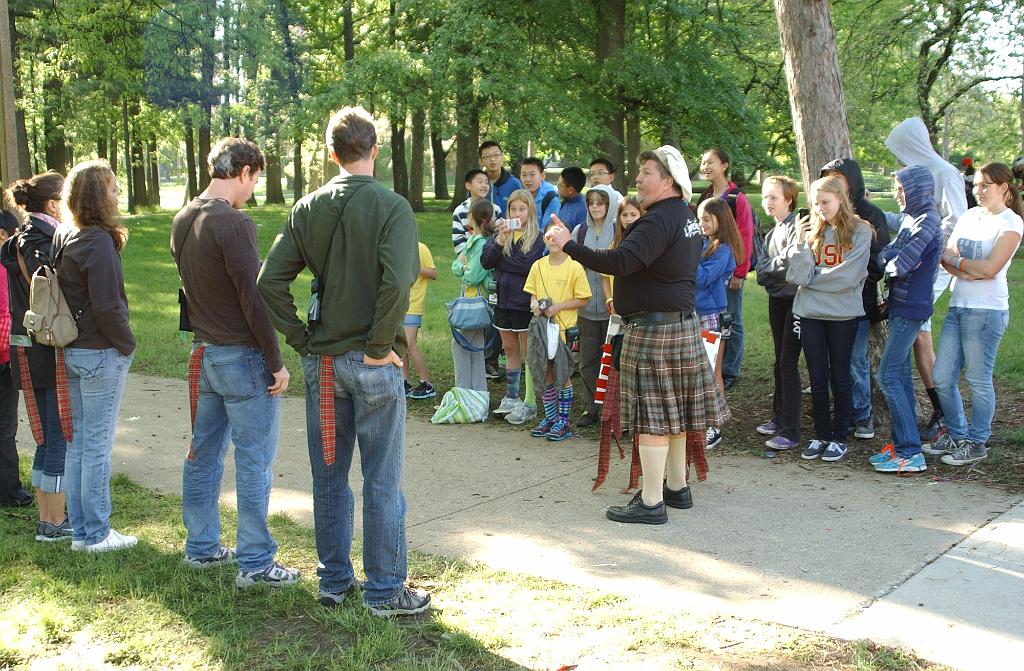 DSC_6494.JPG - Coaches get their tarpon tails after their team complete spontaneous at 2013 Odyssey of the Mind world finals.