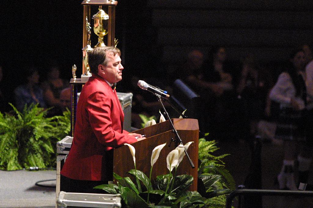 IMG_2700.JPG - Sammy Micklus speaks to the crowd at the 2013 Odyssey world finals awards ceremony.